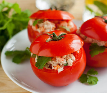 These salmon stuffed tomatoes are super delicious and make for a great light dinner or side dish. Serve this recipe with rice and enjoy the Italian feel to it!