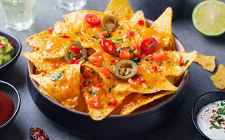For a great treat, try our Nachos Grande Recipe, a dish starring tortilla chips, cheese, jalapeno peppers and salsa - buen provecho!